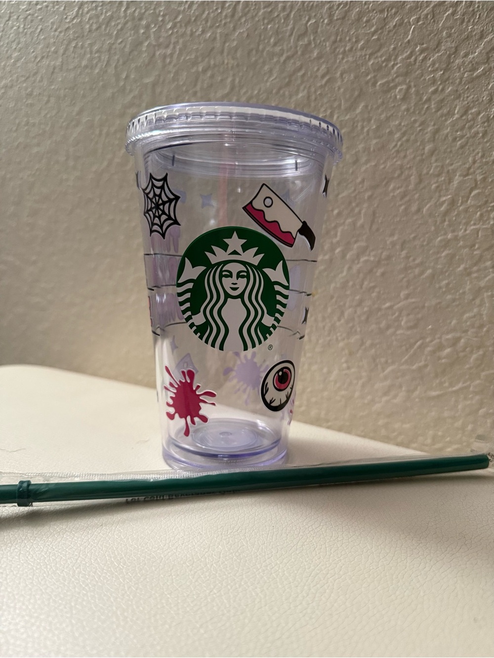Starbucks Clear Halloween Cup with Green Logo and Pink Accents